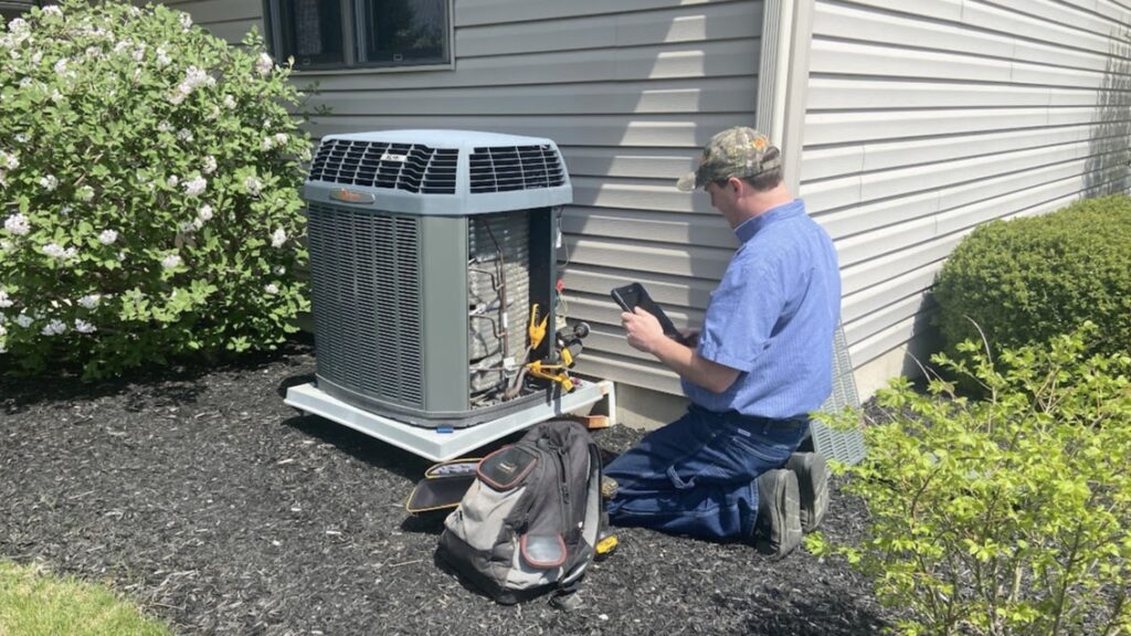 AC tune-up on Trane system by Logan Services.