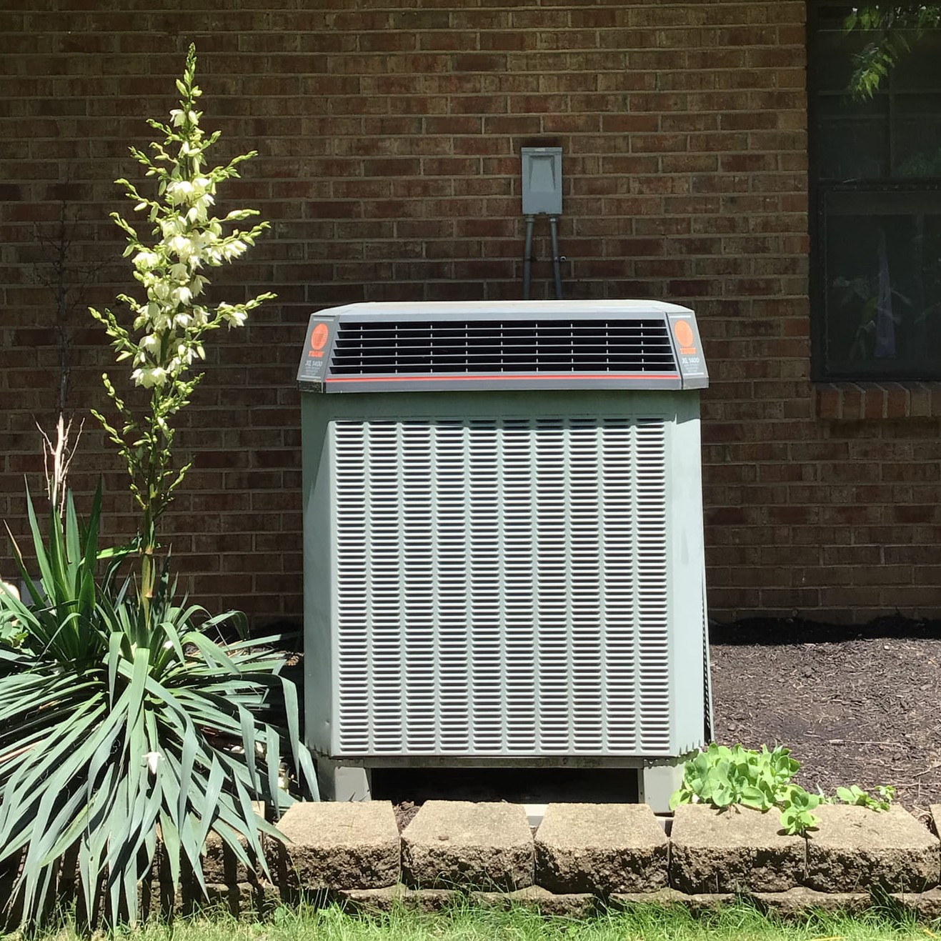 Kettering, OH, 20-year-old heat pump that was replaced by Logan Services.