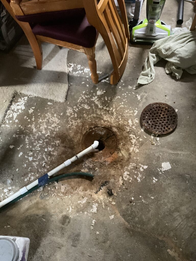 Customer's sewer line in the basement clog cleared by Logan Services.