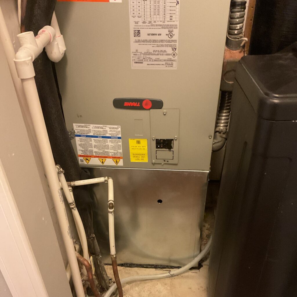 Trane air handler for complete heat pump replacement in Dayton by Logan Services.