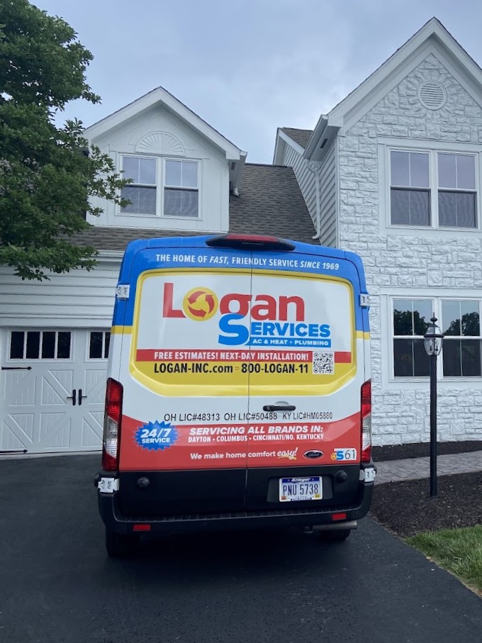 Logan Services van in customer driveway