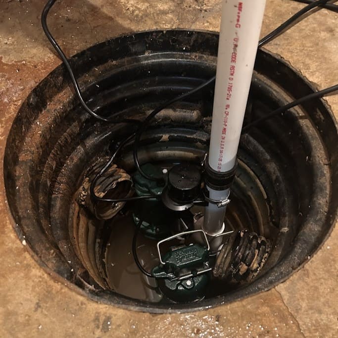 Basement Sump Pump installed by Logan Services plumbers.