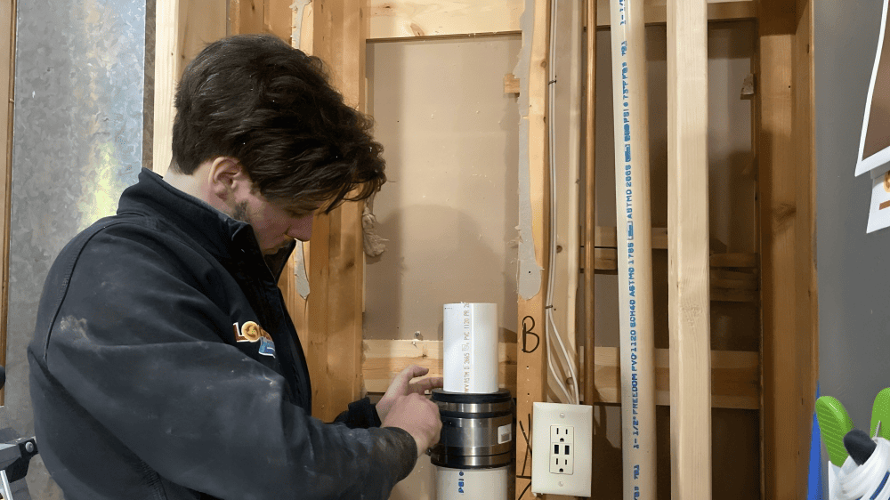 Logan Services plumber re-piping customer kitchen