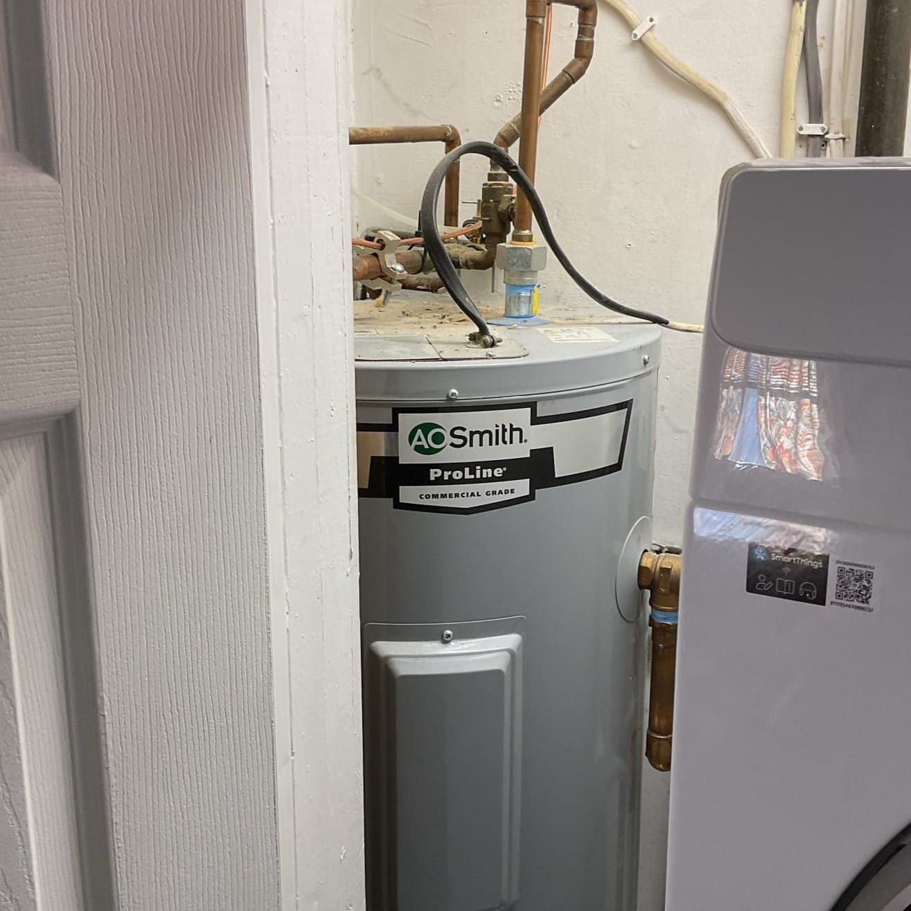 AO Smith Water Heater repaired by Logan Services plumbers in Milford, OH.