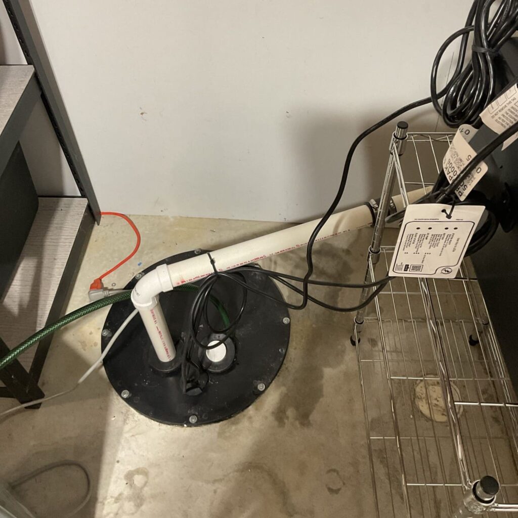 Sump pump repair performed by Logan Services plumbers in Milford, OH.