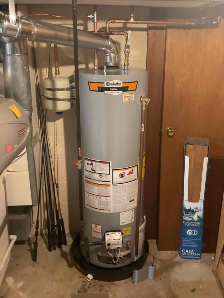 Tank water heater installed by Logan Services plumbers.