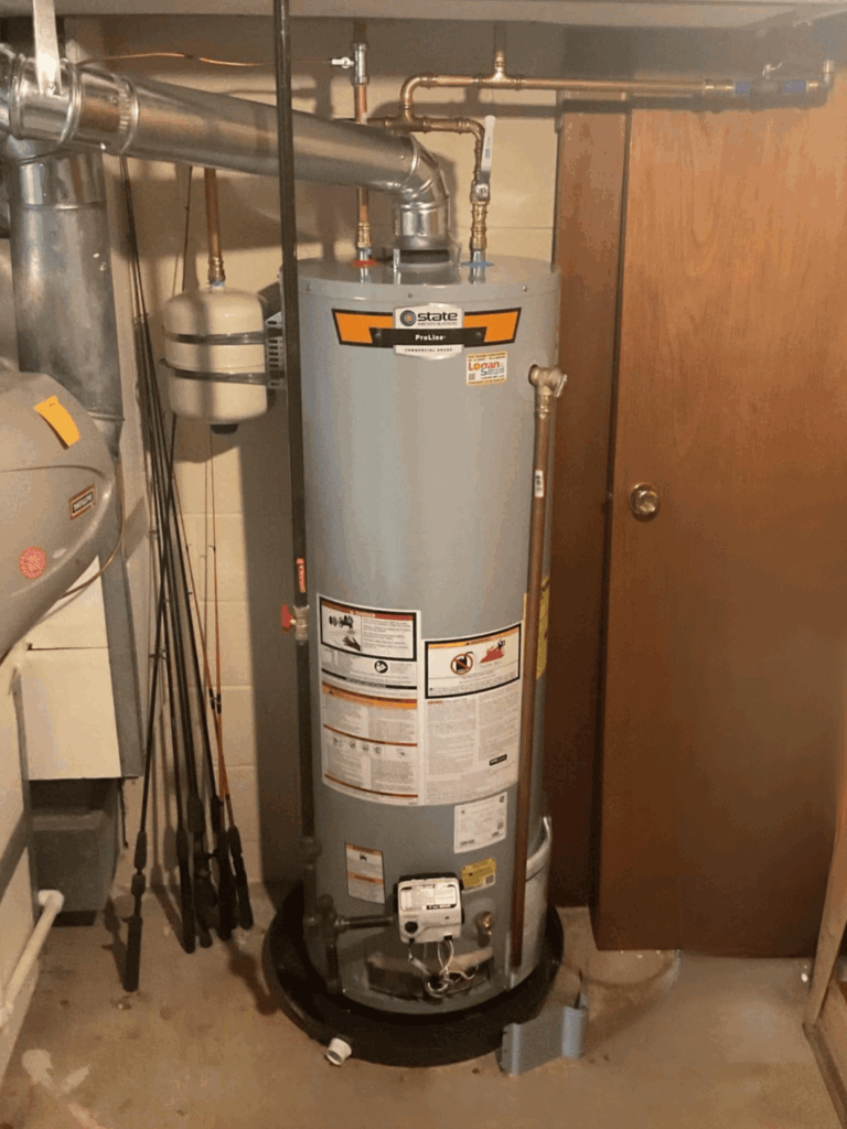 Tank water heater installed by Logan Services plumbers.