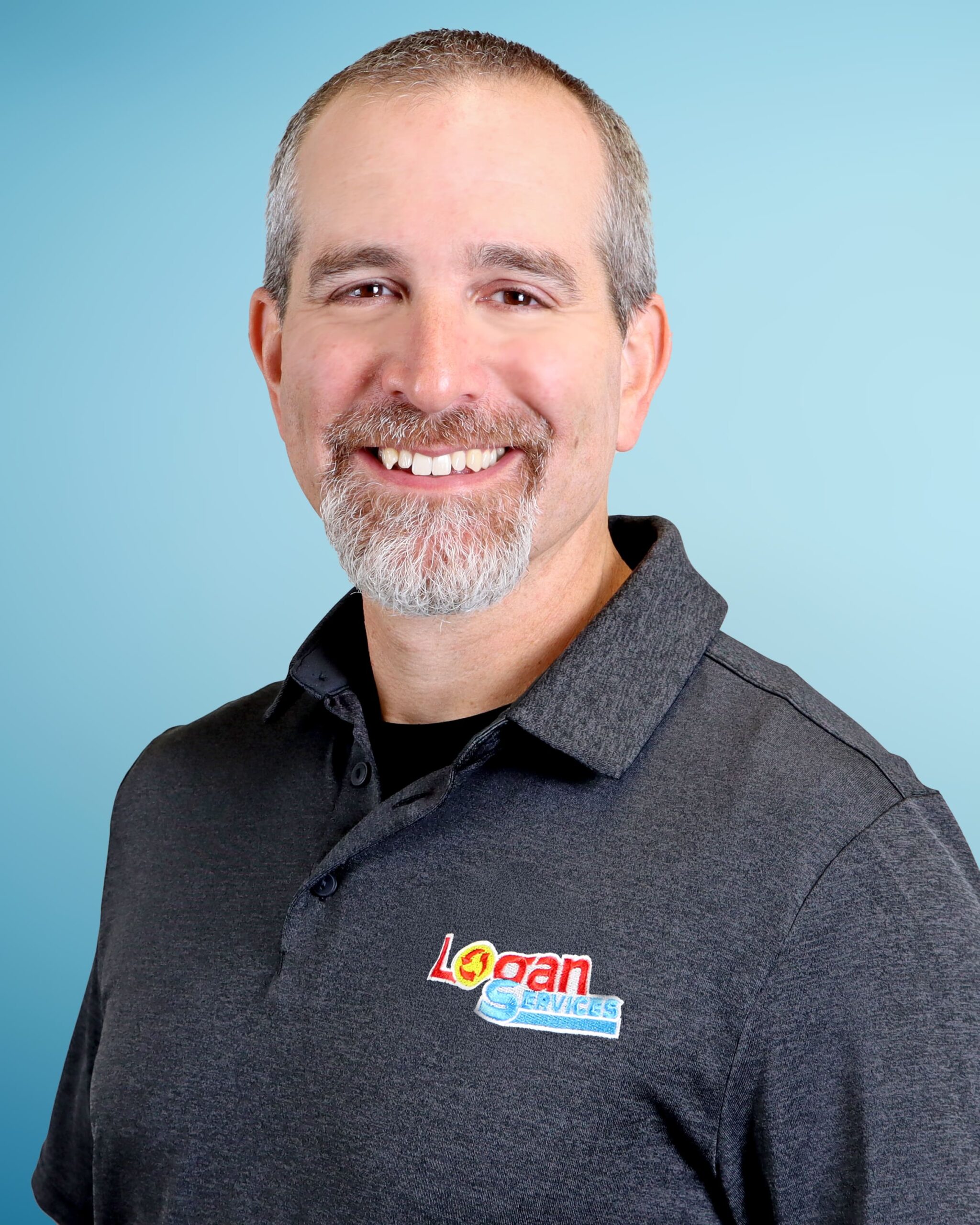 Headshot of Logan Services employee