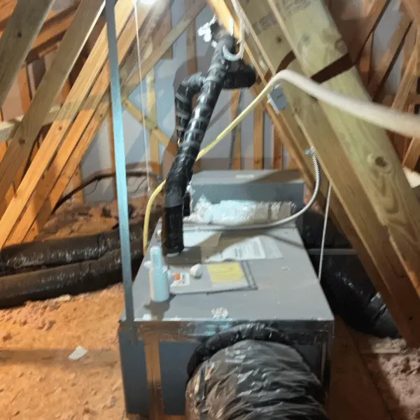 Attic furnace serviced by Logan Services