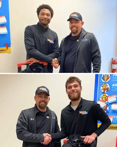 Logan Services apprenticeship graduates shaking hands with trainer